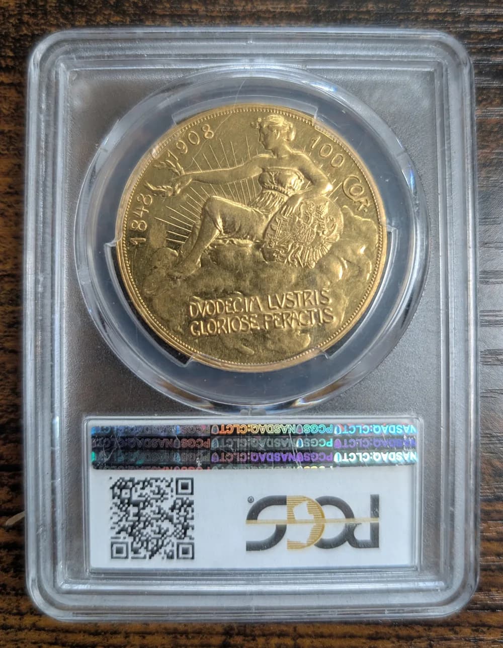 1908 Austria 100 corona gold coin of Franz Joseph I, the Lady in the Clouds type, in a PCGS AU55 holder