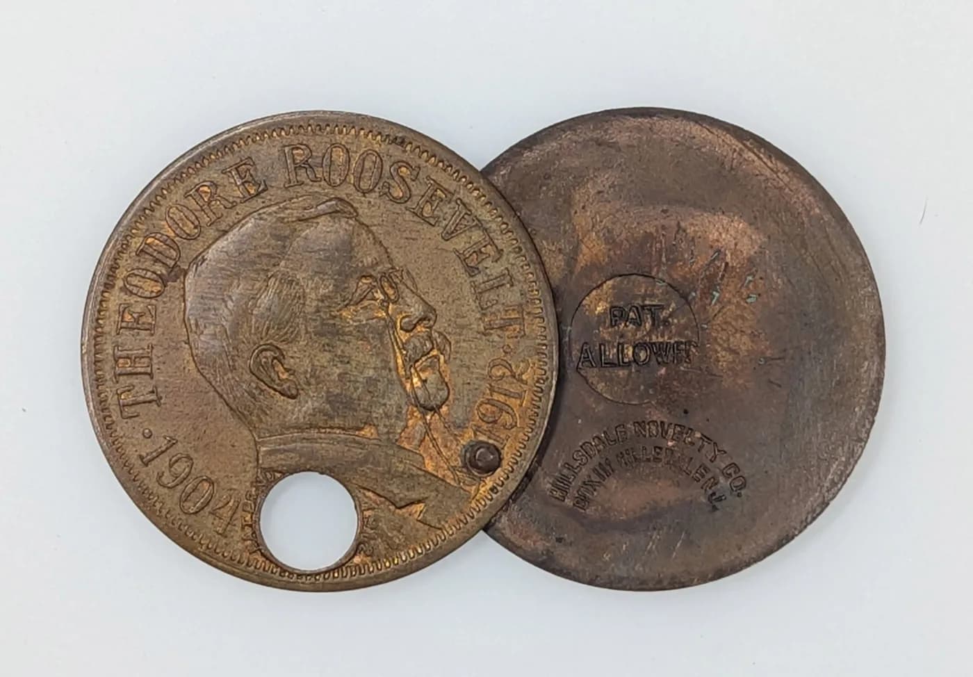 Theodore Roosevelt 1912 Bull Moose brass cigar cutter, a functional object carrying campaign branding